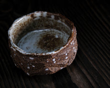 Load image into Gallery viewer, "Balanced Rock" Handmade Kurinuki Faceted Stoneware Tea Bowl w/ Inclusions & Yin Yang Foot