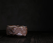 Load image into Gallery viewer, "Balanced Rock" Handmade Kurinuki Faceted Stoneware Tea Bowl w/ Inclusions & Yin Yang Foot