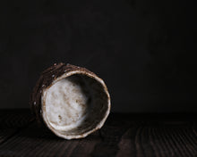 Load image into Gallery viewer, "Balanced Rock" Handmade Kurinuki Faceted Stoneware Tea Bowl w/ Inclusions & Yin Yang Foot